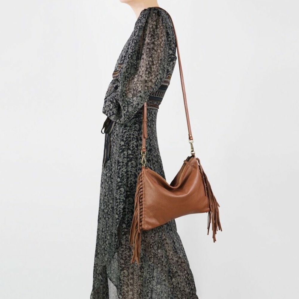 Mofe fringe leather handbag.